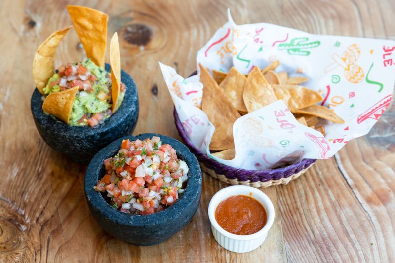 Chunky guacamole with tortilla chips